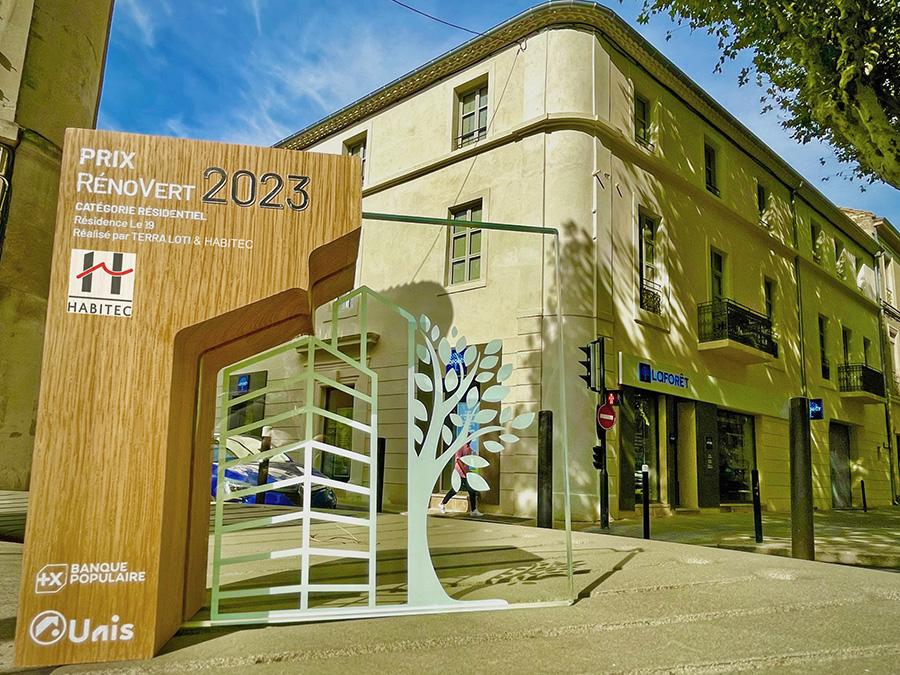 prix Rénovert devant la façade du programme immobilier Le 19